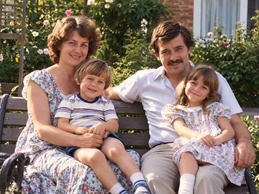 A 1980s family portrait on a garden bench — illustrative after photo