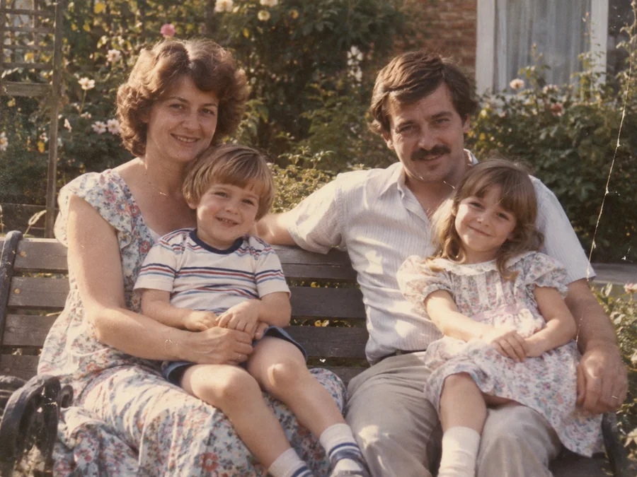 A 1980s family portrait on a garden bench — illustrative before photo