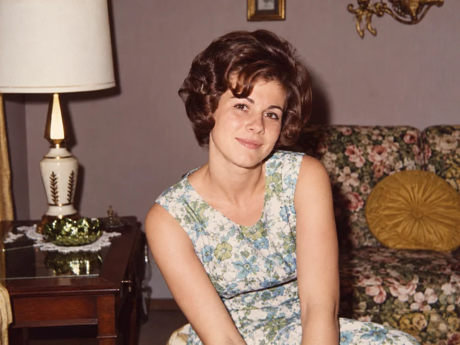 A faded 1960s color portrait of a young woman — illustrative after photo